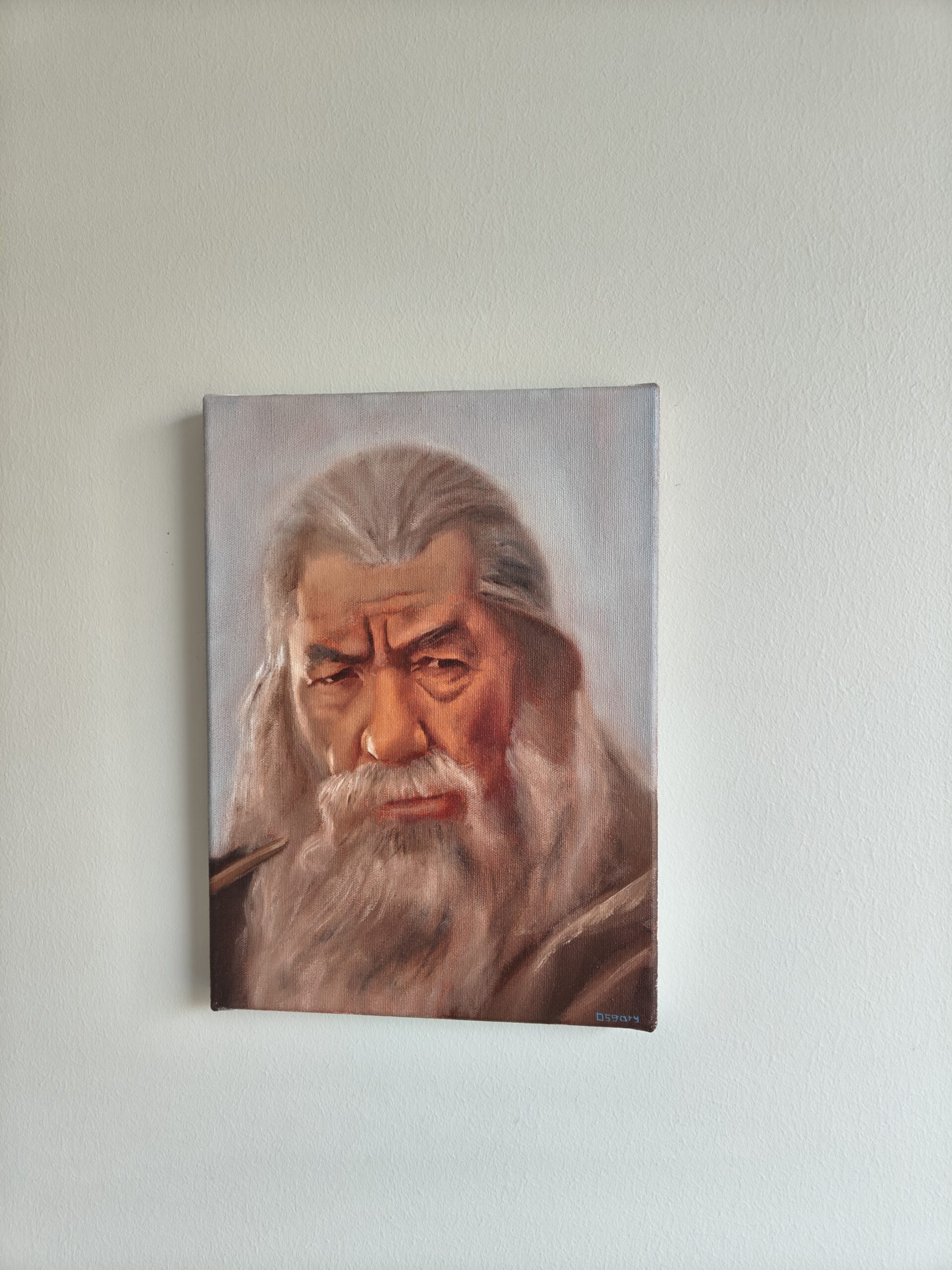 Original Gandalf oil painting hanging on a wall by Oskari Myllymäki, showcasing the scale and presence of the canvas.