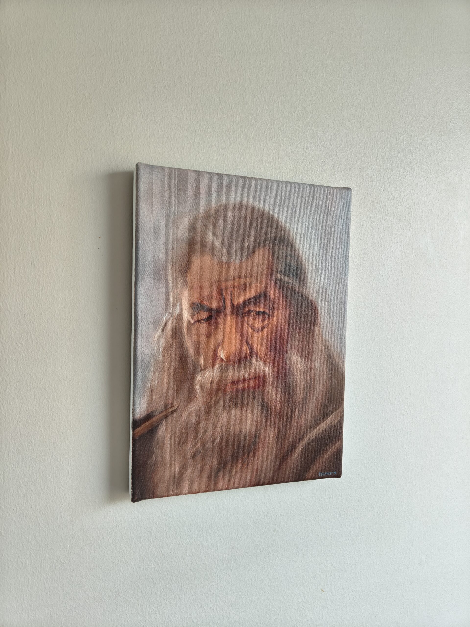 Side view of the original Gandalf oil painting by Oskari Myllymäki, showing the depth and wrapped edges of the stretched canvas.