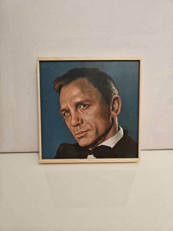 Detail of traditional oil textures on a hand-painted James Bond portrait, 8x8 inch wood panel art.