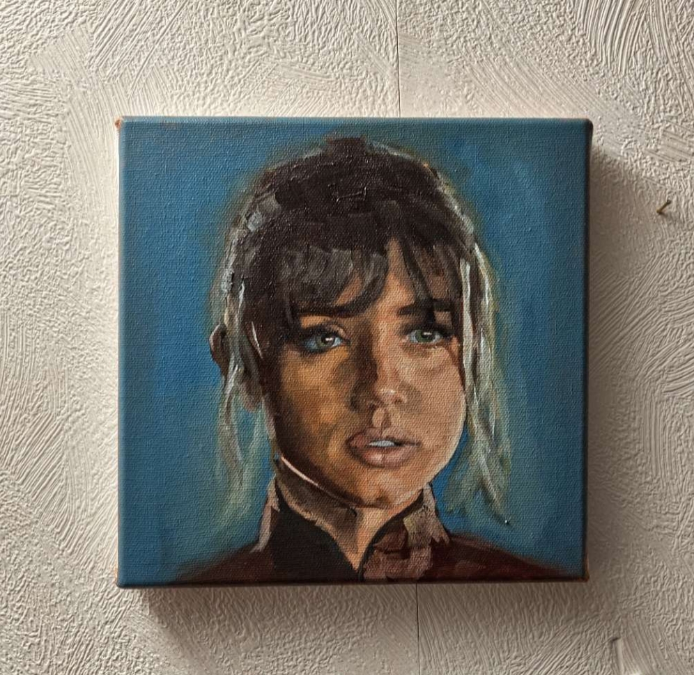 A close-up portrait of the character Joi from Blade Runner 2049, hand-painted with professional Michael Harding oils on a square stretched canvas. The artwork showcases realistic skin tones and soft lighting characteristic of contemporary fine art portraiture.