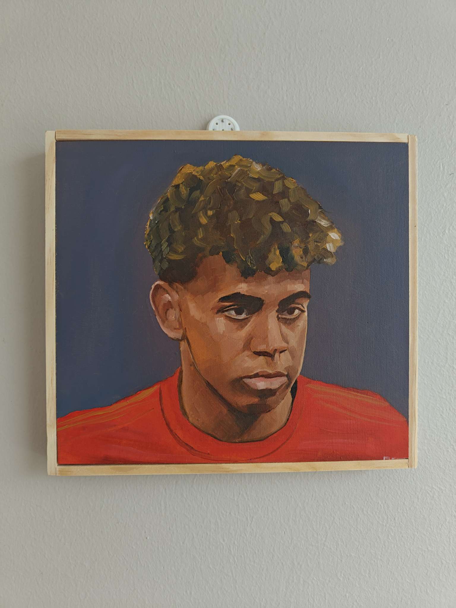 Oil painting of Lamine Yamal in Spain national team. Painted on wooden panel with Michael Harding oils