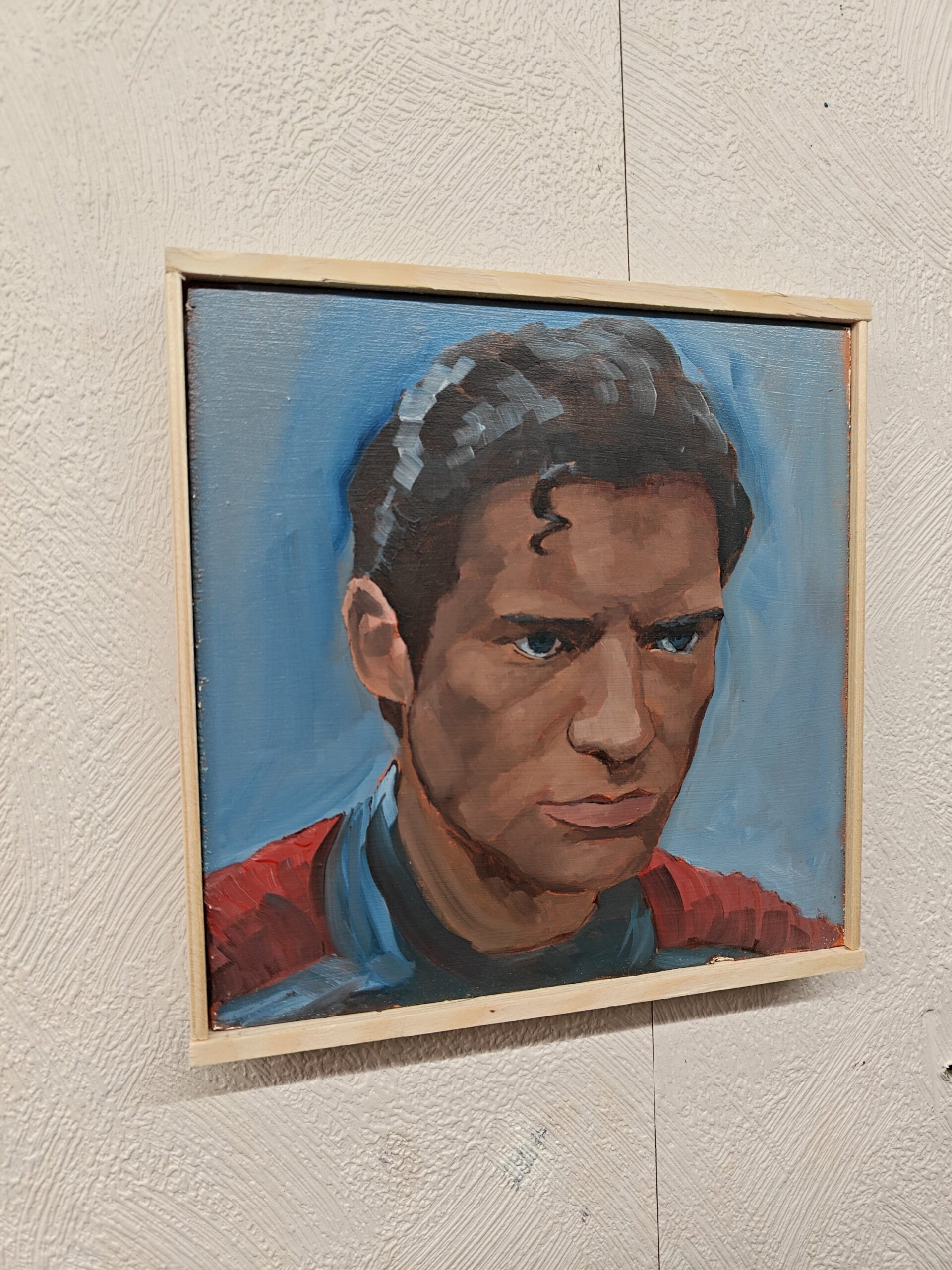 Corner detail of the bespoke wood floater frame housing the Superman original oil painting
