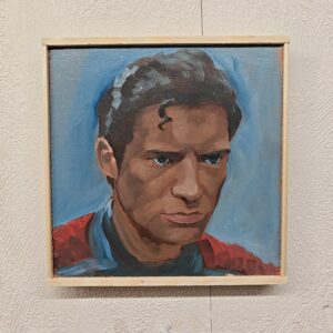 Hand-painted Superman David Corenswet art in a wooden frame displayed on a textured studio wall.
