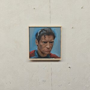 Side profile of Superman oil painting showing texture of professional oil pigments