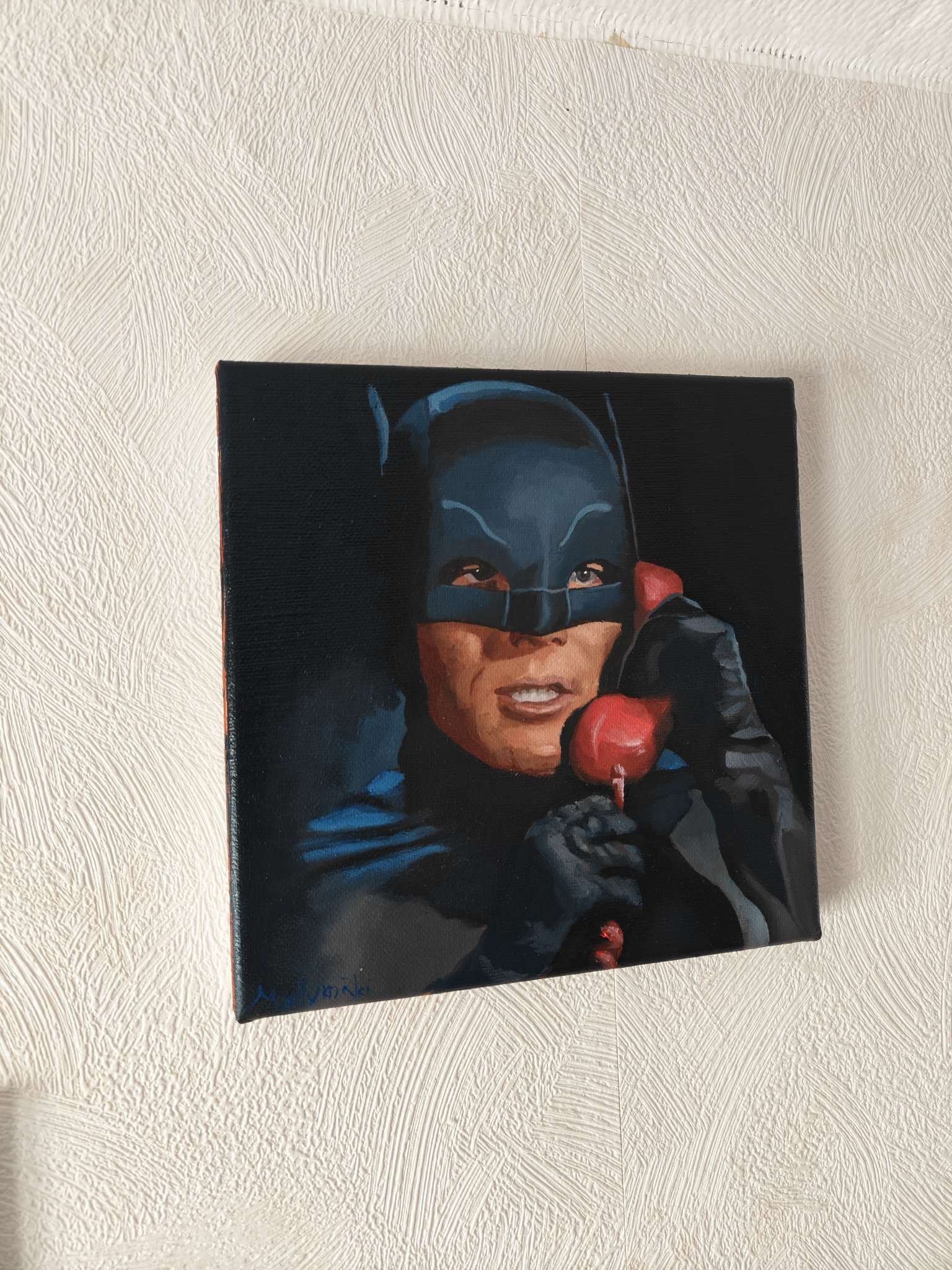 ⁠The Adam West Batman original oil painting displayed to highlight the striking cinematic realism and vibrant red Batphone