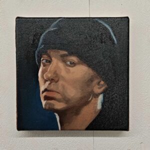 Front view of the 20x20cm Eminem original oil painting on stretched canvas capturing the rap legend in a dark beanie