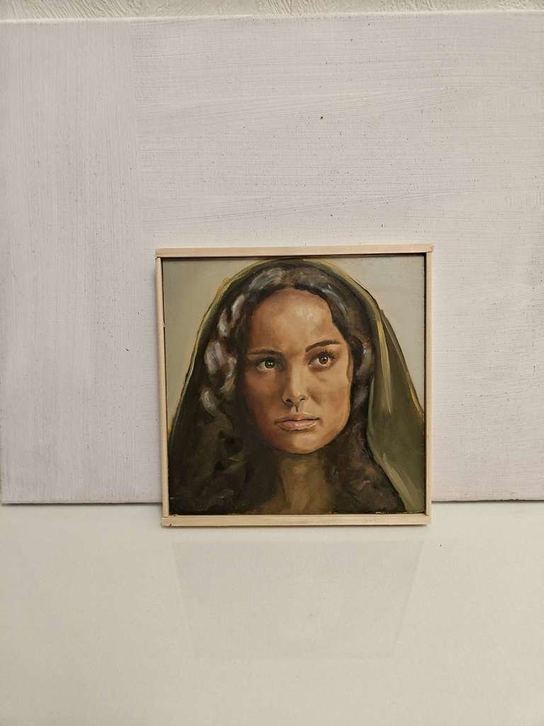 Front view of the 20x20cm Padme Amidala original oil painting on wood capturing Natalie Portman in her green velvet hood⁠