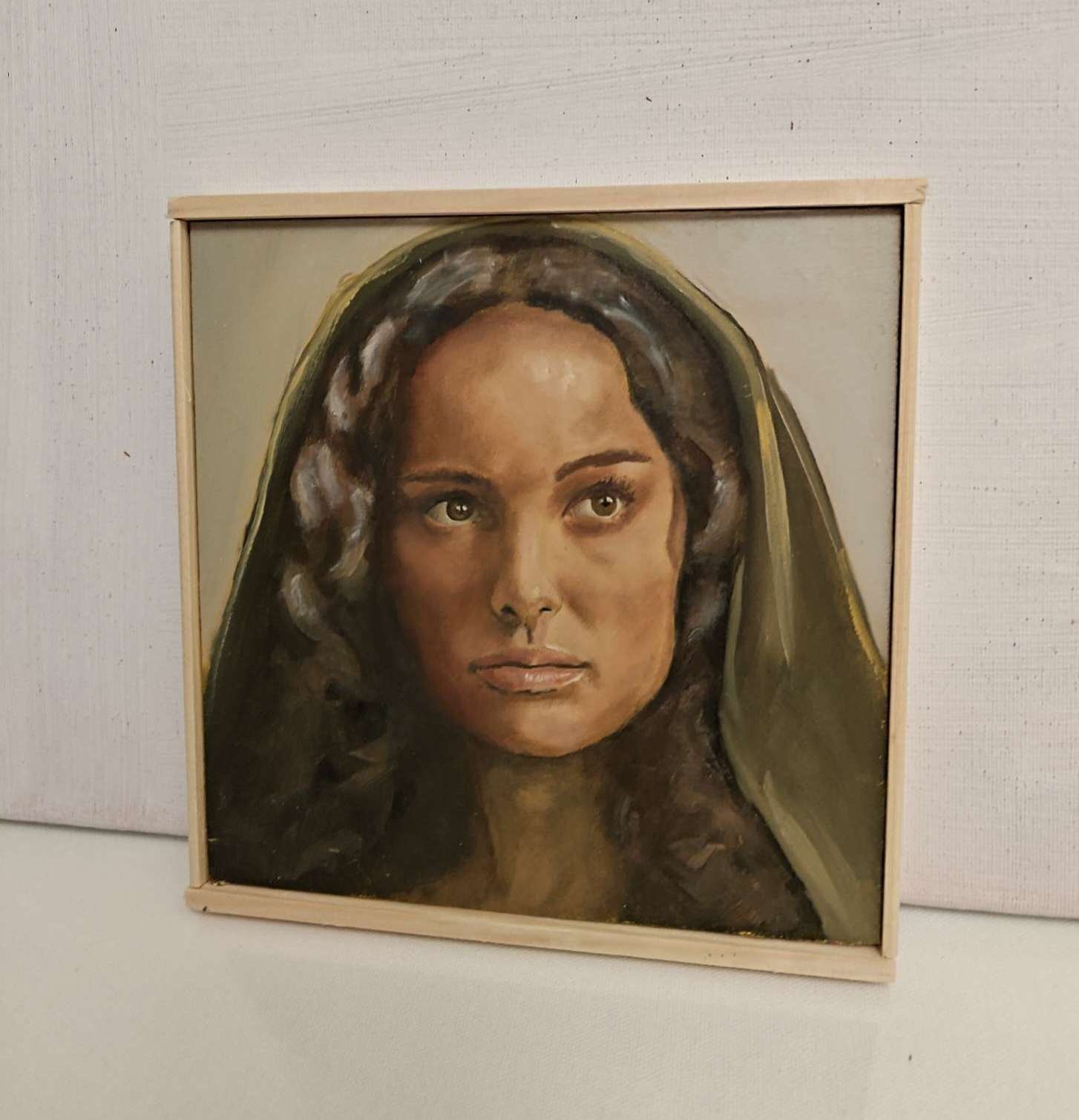 The Padme Amidala original oil painting displayed under studio lighting